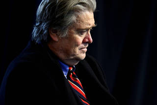 FILE PHOTO: White House Senior Advisor Bannon attends a roundtable discussion held by U.S. President Trump with auto industry leaders at the American Center for Mobility in Ypsilanti Township