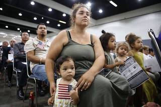 Thousands Of Immigrants Become U.S. Citizens During Naturalization Ceremony At Los Angeles Convention Center