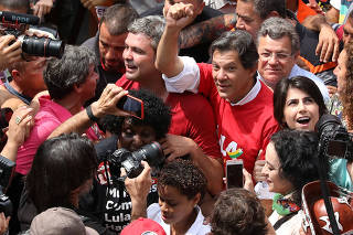 Workers Party presidential candidate Haddad attends a rally at the Rocinha slum in Rio de Janeiro