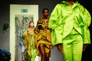 Models present creations at the Richard Malone catwalk show at London Fashion Week Women's, London