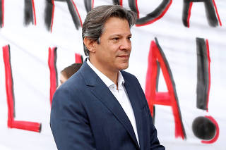 Workers Party presidential candidate Haddad leaves the Federal Police headquarters, where Brazilian former President Luiz Inacio Lula da Silva is imprisoned, after visiting him in Curitiba