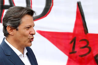 FILE PHOTO: Workers Party presidential candidate Haddad leaves the Federal Police headquarters, where Brazilian former President Luiz Inacio Lula da Silva is imprisoned, after visiting him in Curitiba