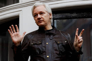 FILE PHOTO: WikiLeaks founder Julian Assange is seen on the balcony of the Ecuadorian Embassy in London