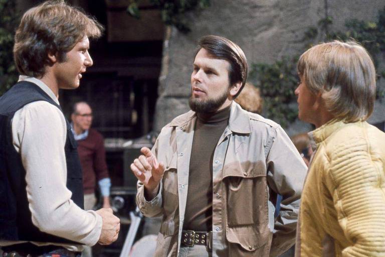 Ao centro,Gary Kurtz, produtor dos primeiros filmes de 'Star Wars', com Harrison Ford (esq.) e Mark Hamill
