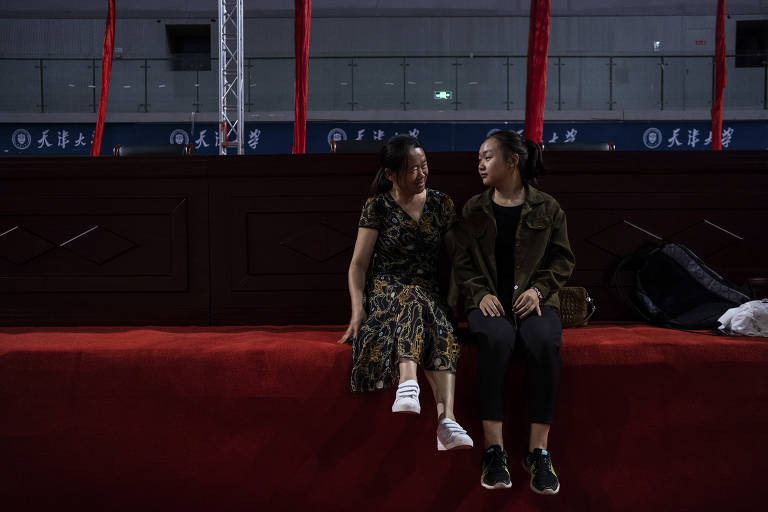 Yang Luping e sua filha Lu Yihzuo, estudante em Tianjin