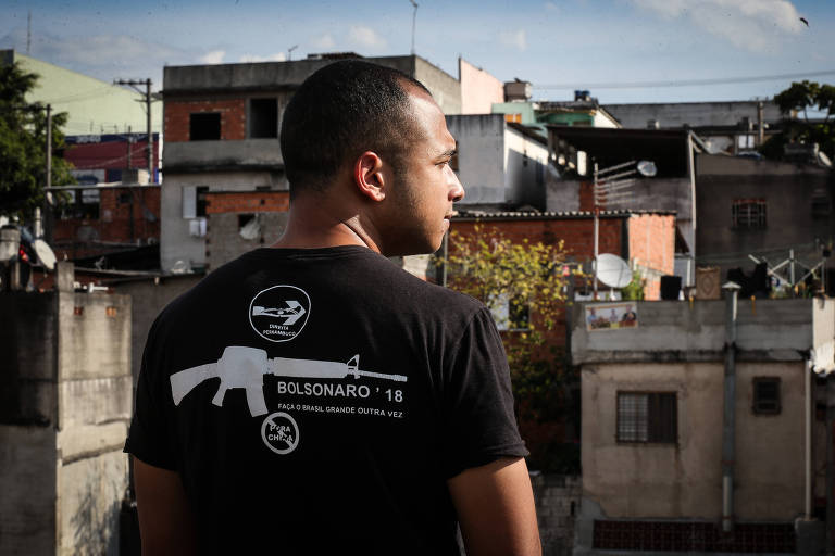 Douglas Garcia, 24,  um dos idealizadores do bloco carnavalesco Porão do Dops, na lage de sua casa, numa favela na zona sul paulistana