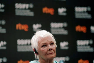 FILE PHOTO: English actor Judi Dench takes part in a news conference at the San Sebastian Film Festival