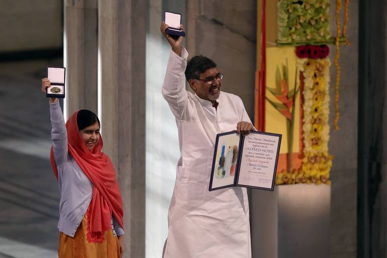 <b>2014</b>
<b>Malala Yousafzai (Paquistão) e Kailash Satyarthi (Índia)</b>
A jovem paquistanesa e o indiano foram premiados pela defesa dos direitos das crianças e à educação
