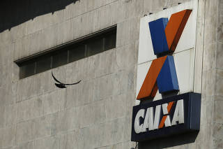 A view shows the company logo of Caixa Economica Federal bank in downtown Rio de Janeiro