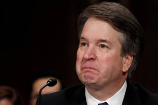 FILE PHOTO: U.S. Supreme Court nominee Kavanaugh becomes emotional testifies before a Senate Judiciary Committee confirmation hearing on Capitol Hill in Washington