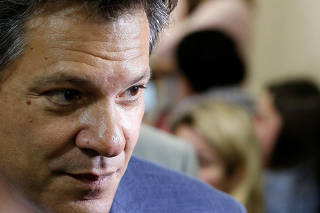 Haddad, presidential candidate of Brazil's leftist Workers' Party (PT), arrives to a news conference in Curitiba