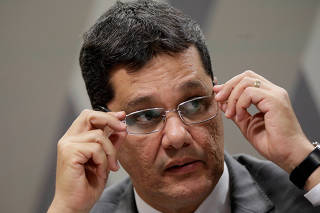 Senator Ferraco, rapporteur for labor reform, gestures during a meeting at Economic Affairs Committee (CAE) of the Brazilian Federal Senate in Brasilia
