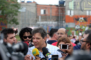 Haddad, presidential candidate of Brazil's leftist Workers' Party (PT), talks with journalists during a meeting with cultural groups of the periphery in Sao Paulo