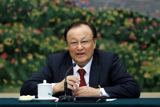 FILE PHOTO: The Chairman of the Xinjiang Uyghur Autonomous Region Shohrat Zakir talks during a session of the Xinjiang Uyghur Autonomous Region on the sidelines of the National People's Congress in Beijing