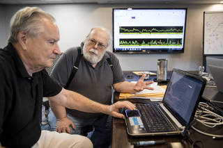 Curtis Rogers, left, and John Olson, co-creators of the GEDmatch database that can now identify 60 percent of Americans of Northern European ancestry, in Houston.