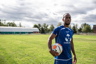 Kerfallo Sissoko, from Guinea, who says he was brutally attacked during a racially inspired melee at a match in May, at a soccer field in Benfeld, France.