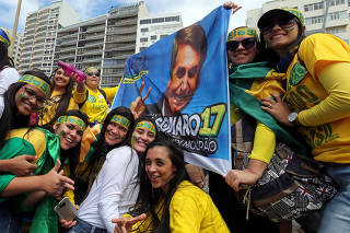 Supporters of Jair Bolsonaro attend a demonstration in Rio de Janeiro