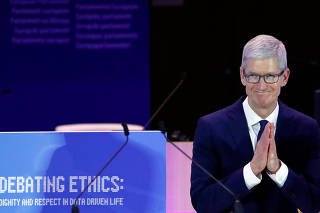 Apple CEO Tim Cook delivers a keynote during the European Union's privacy conference at the EU Parliament in Brussels