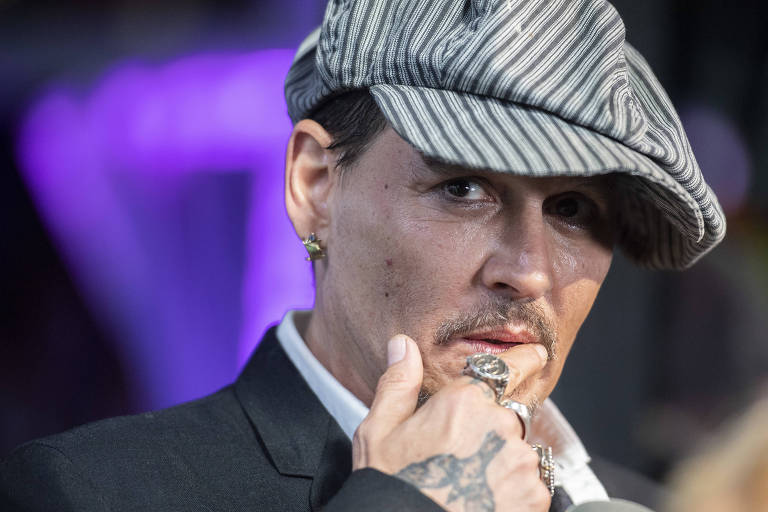 O ator Johnny Depp posa em festival de cinema na Alemanha