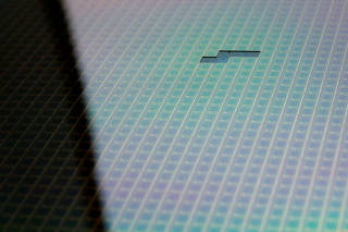 FILE PHOTO: A semiconductor wafer is seen at Tsinghua Unigroup research centre in Beijing