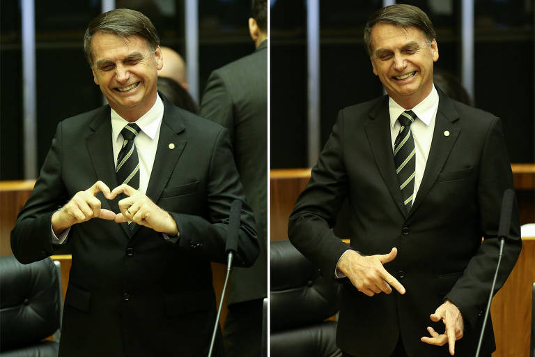 O presidente eleito, Jair Bolsonaro (PSL), faz gestos de coração e de arma, que marcou sua campanha, em sessão de comemoração dos 30 anos da Constituição