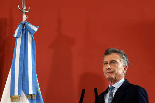 Argentina's President Mauricio Macri arrives for a ceremony at the Casa Rosada Presidential Palace in Buenos Aires
