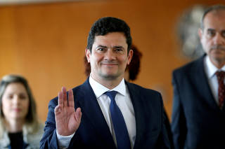 Brazilian anti-corruption judge Sergio Moro, Brazil's President-elect Jair Bolsonaro's pick for Justice Minister, gestures after a meeting with Bolsonaro, in Brasilia