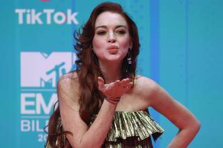 Singer and Actress Lindsay Lohan blows a kiss as she arrives at the 2018 MTV Europe Music Awards at Bilbao Exhibition Centre in Bilbao