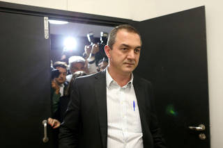 FILE PHOTO: FILE PHOTO: Brazil's billionaire businessman Joesley Batista is pictured at the Brasilia international airport, after giving testimony in Brasilia