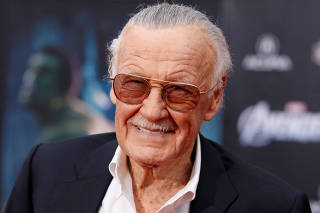 FILE PHOTO - Comic book creator and executive producer Stan Lee poses at the world premiere of the film 