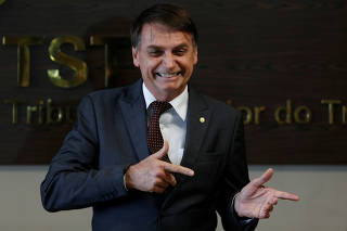 Brazil's President-elect Jair Bolsonaro gestures during a meeting at Superior Labor Court in Brasilia
