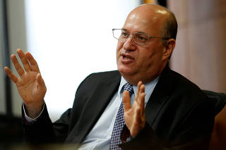 FILE PHOTO: Brazil's Central Bank President Ilan Goldfajn gestures during an interview with Reuters in Brasilia