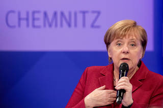 German Chancellor Angela Merkel speaks during the meeting with readers of 'Freie Presse' newspaper in Chemnitz