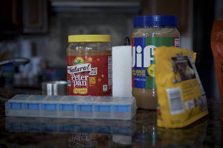 Peanut products sit on the kitchen counter at Carter Grodi?s home in Ocala, Fla.