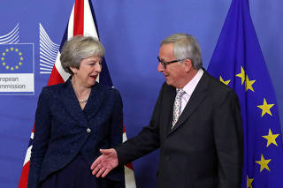 British PM May meets with European Commission President Juncker to discuss draft agreements on Brexit, at the EC headquarters in Brussels