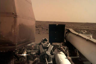 The Instrument Deployment Camera's image of the Martian surface the day the spacecraft touched down on the Red Planet