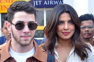Bollywood actress Priyanka Chopra and singer Nick Jonas arrive at the airport in Jodhpur