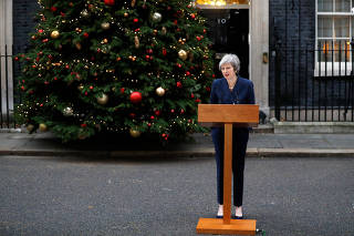 Britain's Prime Minister Theresa May addresses the media outside 10 Downing Street after it was announced that the Conservative Party will hold a vote of no confidence in her leadership, in London