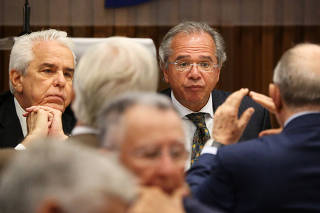 Economist Paulo Guedes, incoming Brazil's Economy Minister and Roberto Castello Branco, chief executive of Petroleo Brasileiro SA, attend a lunch with businessmen at the Federation of Industries of Rio de Janeiro (FIRJAN) headquarters, in Rio de Janeiro