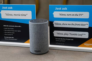 FILE PHOTO: Prompts on how to use Amazon's Alexa personal assistant are seen in an Amazon ?experience centre? in Vallejo