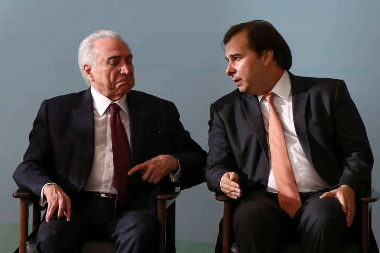 Os presidentes da República, Michel Temer, e da Câmara, Rodrigo Maia, durante cerimônia no Palácio do Planalto, em março deste ano
