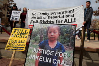 A picture of Jakelin, a 7-year-old girl who died in U.S. custody after crossing illegally from Mexico to the U.S, is seen during a protest to demand justice for her, in El Paso