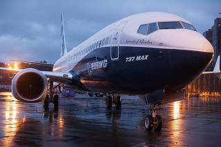 FILE PHOTO - A Boeing 737 MAX 8 sits outside the hangar during a media tour of the Boeing 737 MAX at the Boeing plant in Renton