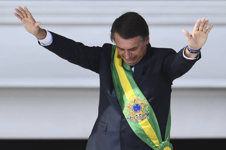 Bolsonaro, com a faixa presidencial, ao tomar posse em janeiro deste ano, em Brasília 