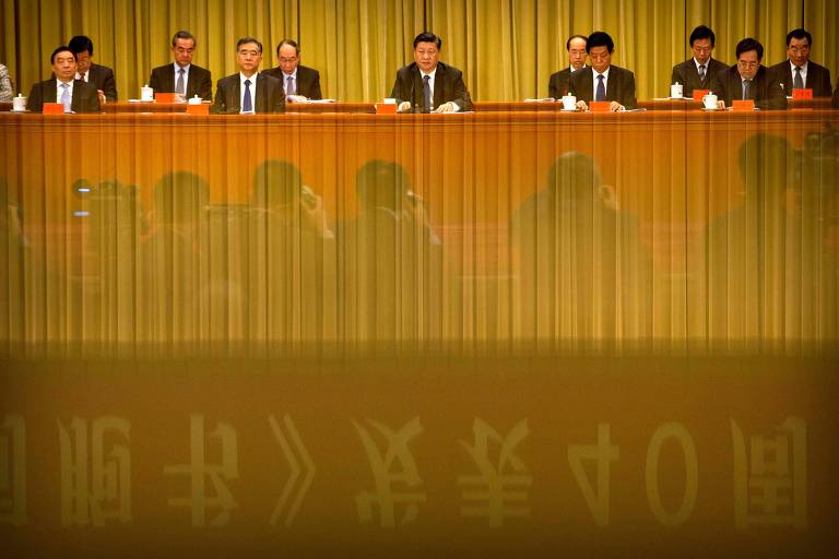 O líder chinês Xi Jinping (centro) durante seu discurso em Pequim sobre Taiwan 
