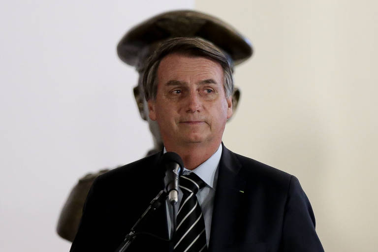 O presidente Jair Bolsonaro na cerimônia de transmissão de cargo do ministro da Defesa, em Brasília