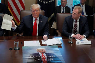 U.S. President Donald Trump and Acting U.S. Defense Secretary Patrick Shanahan during a Cabinet meeting on day 12 of the partial U.S. government shutdown at the White House in Washington