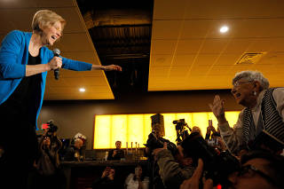 U.S Senator Elizabeth Warren takes the stage at an 