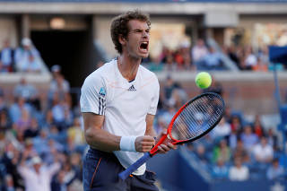 FILE PHOTO: Britain's Andy Murray reacts during the final at the U.S. Open tennis tournament in New York, September 10, 2012