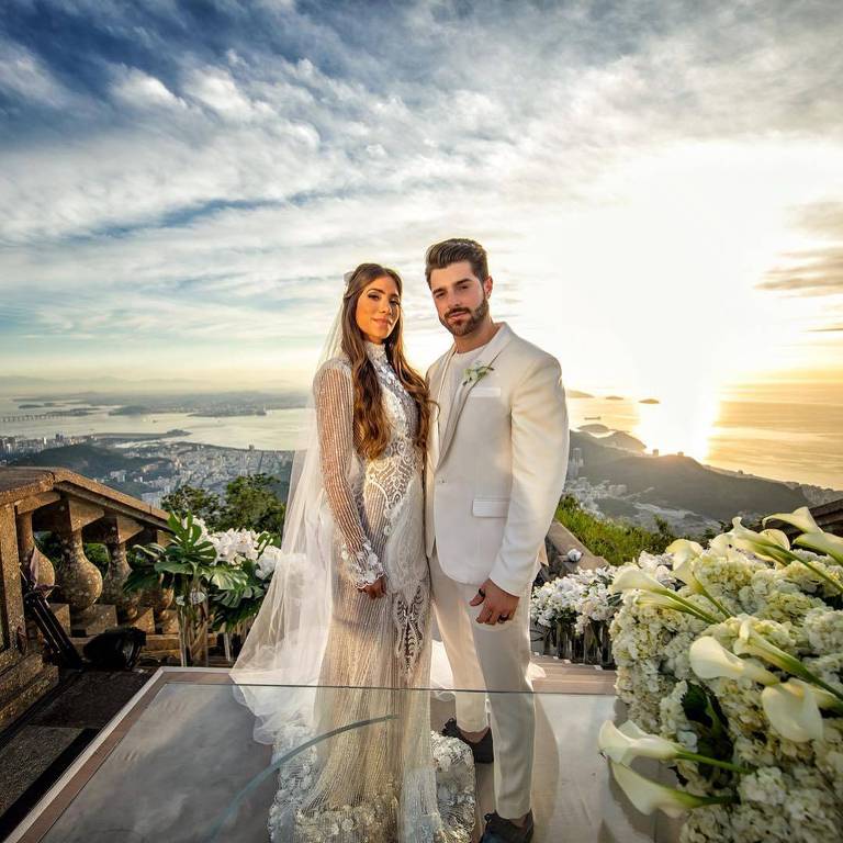 DJ Alok e Romana Novais se casam aos pés do Cristo Redentor no Rio durante o nascer do sol 